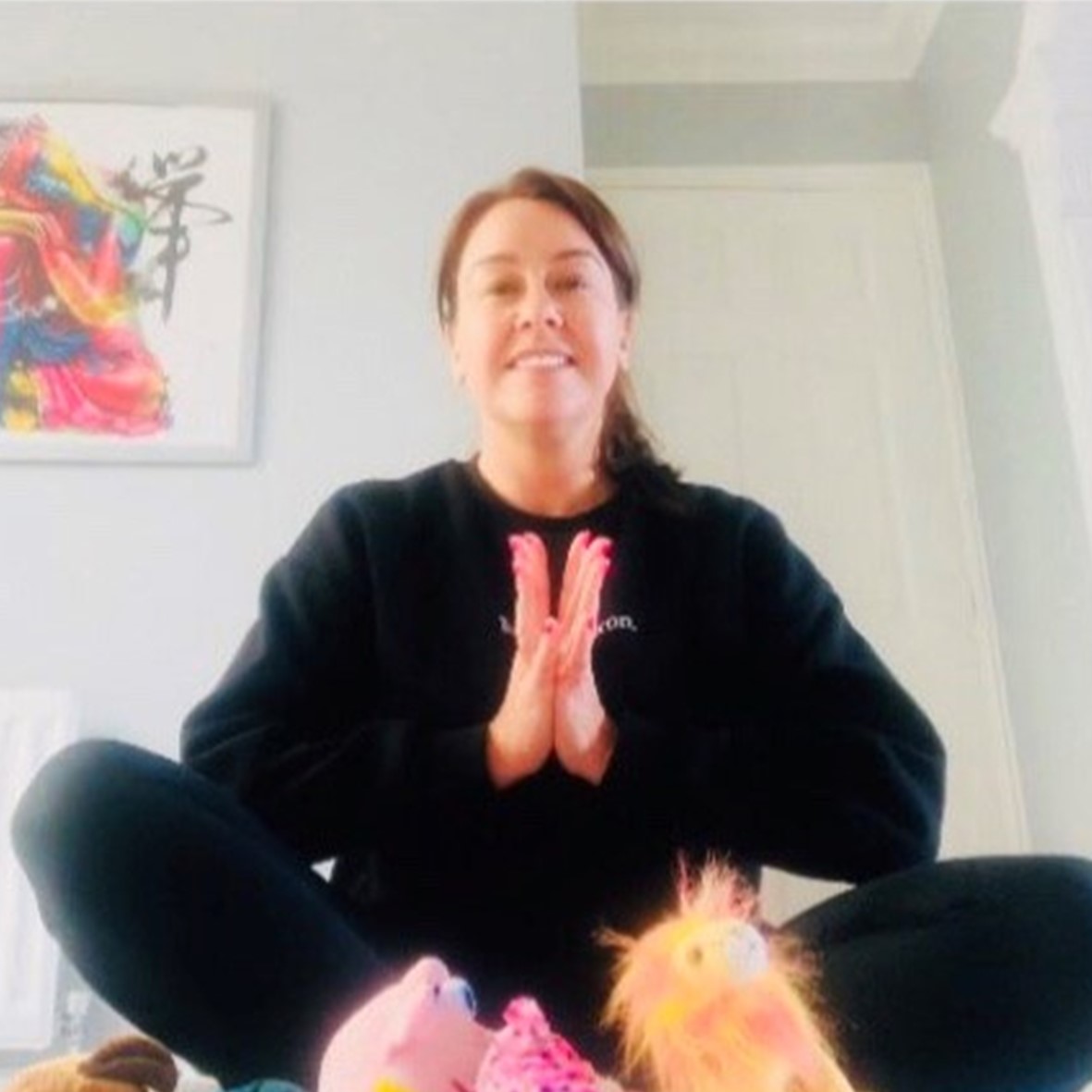 An image of Katie doing some meditation, Katie is the founder and creator of Little Sunshine Mindfulness and Yoga, she has 20 years experience with children.